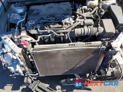 Zdjęcie 11 z 13 samochodu: 2020 TOYOTA CAMRY HYBRID LE VIN:4T1C31AK4LU523038 - miniatura