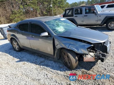 Czwarte zdjęcie samochodu z boku: 2011 DODGE AVENGER MAINSTREET VIN:1B3BD1FB8BN622431 - miniatura