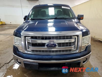 Piąte zdjęcie samochodu w środku: 2013 FORD F150 SUPERCREW VIN:1FTFW1CT0DFA58634 - miniatura