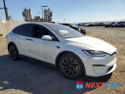 Czwarte zdjęcie samochodu z boku: 2022 TESLA MODEL X VIN:7SAXCDE51NF336981 - miniatura