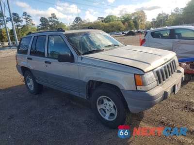 Czwarte zdjęcie samochodu z boku: 1997 JEEP GRAND CHEROKEE LAREDO VIN:1J4FX58SXVC540397 - miniatura