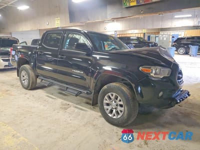 Czwarte zdjęcie samochodu z boku: 2017 TOYOTA TACOMA SR5 V6 VIN:3TMCZ5AN3HM083183 - miniatura