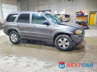 Czwarte zdjęcie samochodu z boku: 2003 MAZDA TRIBUTE LX VIN:4F2YZ941X3KM47248 - miniatura