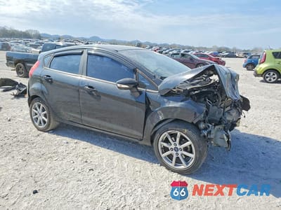 Czwarte zdjęcie samochodu z boku: 2015 FORD FIESTA SE VIN:3FADP4EJXFM148139 - miniatura