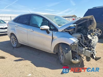 Czwarte zdjęcie samochodu z boku: 2014 FORD FIESTA SE VIN:3FADP4BJXEM191723 - miniatura