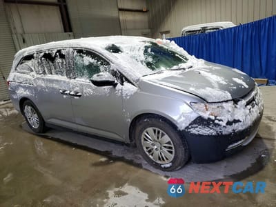 Czwarte zdjęcie samochodu z boku: 2017 HONDA ODYSSEY LX VIN:5FNRL5H27HB001628 - miniatura