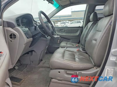 Zdjęcie 7 z 13 samochodu: 2002 HONDA ODYSSEY EXL VIN:2HKRL18952H515783 - miniatura