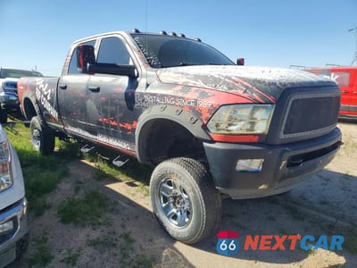 Czwarte zdjęcie samochodu z boku: 2012 DODGE RAM 2500 LARAMIE VIN:3C6UD5KL8CG260955 - miniatura