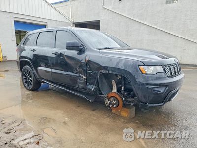 Czwarte zdjęcie samochodu z boku: 2019 JEEP GRAND CHEROKEE LAREDO VIN:1C4RJFAG8KC810450 - miniatura