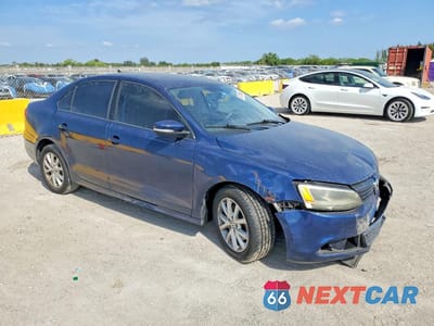 Czwarte zdjęcie samochodu z boku: 2011 VOLKSWAGEN JETTA SE VIN:3VWDX7AJ0BM012546 - miniatura