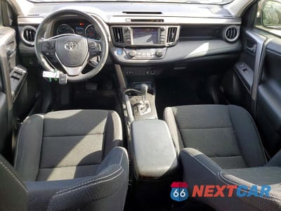 Zdjęcie 8 z 13 samochodu: 2017 TOYOTA RAV4 HYBRID XLE VIN:JTMRJREV9HD135012 - miniatura