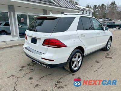 Czwarte zdjęcie samochodu z boku: 2016 MERCEDES-BENZ GLE 350 4MATIC VIN:4JGDA5HB2GA781038 - miniatura