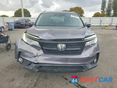 Piąte zdjęcie samochodu w środku: 2021 HONDA PILOT SE VIN:5FNYF5H2XMB010174 - miniatura