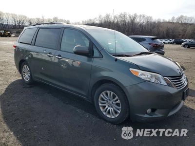 Czwarte zdjęcie samochodu z boku: 2014 TOYOTA SIENNA XLE 8-PASSENGER VIN:5TDYK3DC8ES524469 - miniatura