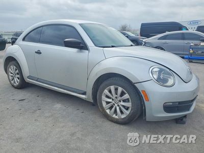 Czwarte zdjęcie samochodu z boku: 2016 VOLKSWAGEN BEETLE 1.8T VIN:3VWF17AT5GM620081 - miniatura