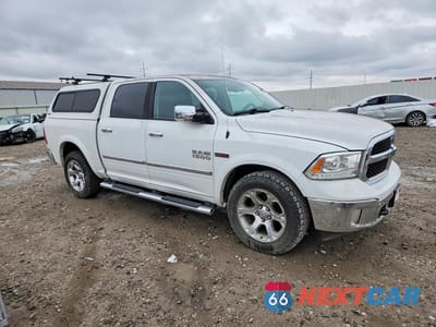 Czwarte zdjęcie samochodu z boku: 2015 RAM 1500 LARAMIE VIN:1C6RR7NM9FS561156 - miniatura