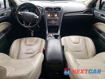 Zdjęcie 8 z 11 samochodu: 2017 FORD FUSION TITANIUM PHEV VIN:3FA6P0SU0HR141965 - miniatura