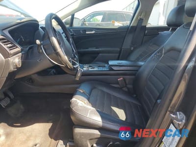 Zdjęcie 7 z 12 samochodu: 2018 FORD FUSION SE HYBRID VIN:3FA6P0LU7JR169847 - miniatura