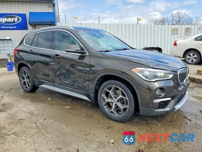 Czwarte zdjęcie samochodu z boku: 2018 BMW X1 SDRIVE28I VIN:WBXHU7C30J5H43094 - miniatura