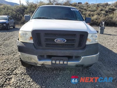 Piąte zdjęcie samochodu w środku: 2005 FORD F150 VIN:1FTRX14W05NB01198 - miniatura
