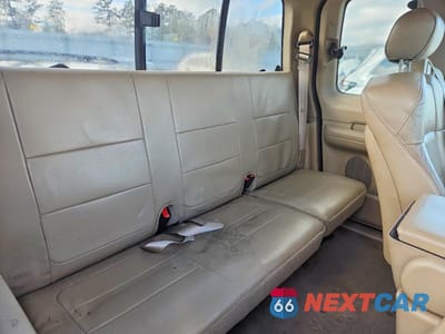 Zdjęcie 10 z 12 samochodu: 2002 FORD F150 VIN:1FTRX18L72NB17510 - miniatura