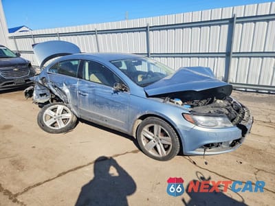 Czwarte zdjęcie samochodu z boku: 2013 VOLKSWAGEN CC SPORT VIN:WVWBP7AN4DE503904 - miniatura