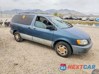 Czwarte zdjęcie samochodu z boku: 2001 TOYOTA SIENNA LE VIN:4T3ZF13C61U377687 - miniatura