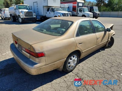 Trzecie zdjęcie samochodu z tyłu: 1998 TOYOTA CAMRY CE VIN:JT2BG22K1W0103069 - miniatura