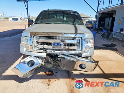 Piąte zdjęcie samochodu w środku: 2014 FORD F150 SUPERCREW VIN:1FTFW1CF1EKF38975 - miniatura