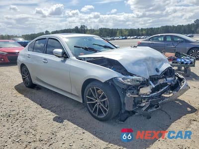Czwarte zdjęcie samochodu z boku: 2019 BMW 330XI VIN:WBA5R7C53KAJ84128 - miniatura