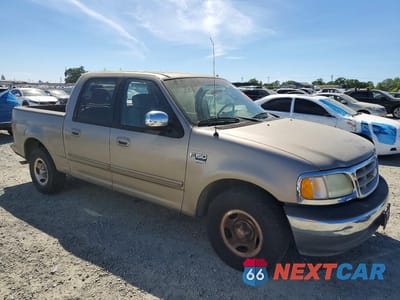 Czwarte zdjęcie samochodu z boku: 2002 FORD F150 VIN:1FTRW07622KC35264 - miniatura