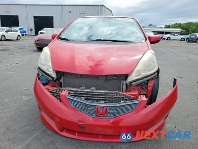 Piąte zdjęcie samochodu w środku: 2009 HONDA FIT SPORT VIN:JHMGE88489S043801 - miniatura