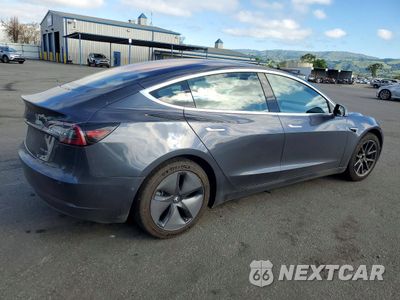 Trzecie zdjęcie samochodu z tyłu: 2018 TESLA MODEL 3 VIN:5YJ3E1EB2JF144795 - miniatura
