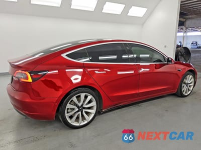 Trzecie zdjęcie samochodu z tyłu: 2019 TESLA MODEL 3 VIN:5YJ3E1EA4KF413209 - miniatura
