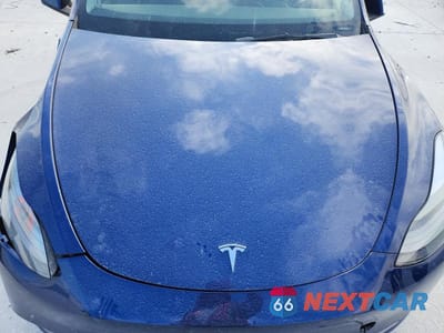 Zdjęcie 12 z 14 samochodu: 2023 TESLA MODEL Y VIN:7SAYGAEE6PF669008 - miniatura