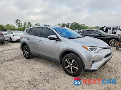 Czwarte zdjęcie samochodu z boku: 2018 TOYOTA RAV4 XLE VIN:2T3WFREV7JW477099 - miniatura