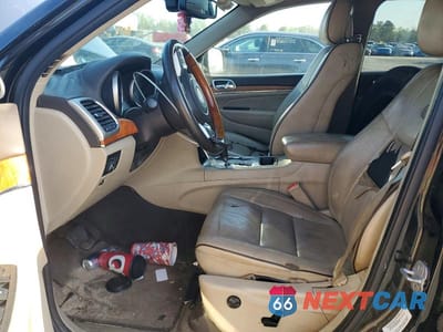 Zdjęcie 7 z 13 samochodu: 2013 JEEP GRAND CHEROKEE OVERLAND VIN:1C4RJECG9DC526108 - miniatura
