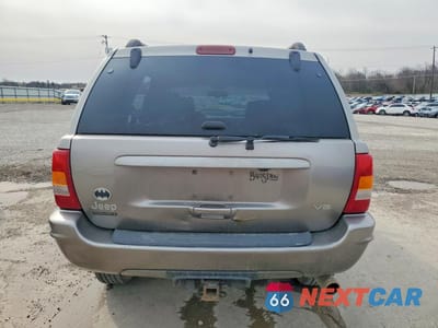 Zdjęcie 6 z 13 samochodu: 1999 JEEP GRAND CHEROKEE LIMITED VIN:1J4GW68N1XC671972 - miniatura