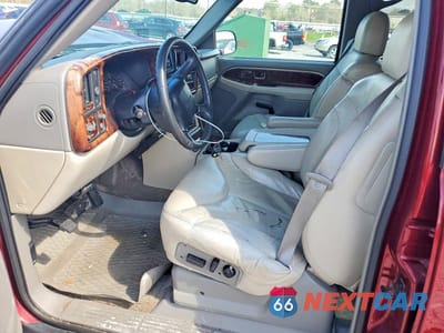 Zdjęcie 7 z 11 samochodu: 2001 GMC YUKON VIN:1GKEC13T01R151544 - miniatura
