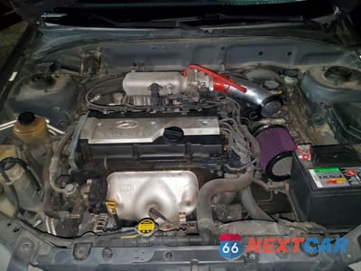 Zdjęcie 12 z 14 samochodu: 2002 HYUNDAI ACCENT VIN:KMHCG35C12U213978 - miniatura