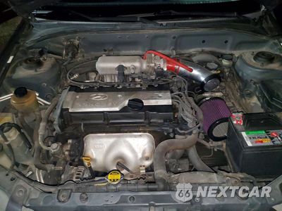 Zdjęcie 12 z 14 samochodu: 2002 HYUNDAI ACCENT VIN:KMHCG35C12U213978 - miniatura