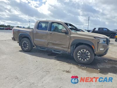 Czwarte zdjęcie samochodu z boku: 2024 NISSAN FRONTIER PRO-4X VIN:1N6ED1EK7RN645655 - miniatura