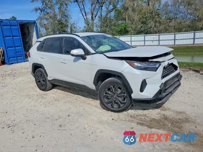 Czwarte zdjęcie samochodu z boku: 2023 TOYOTA RAV4 HYBRID SE VIN:JTM16RFVXPJ037524 - miniatura