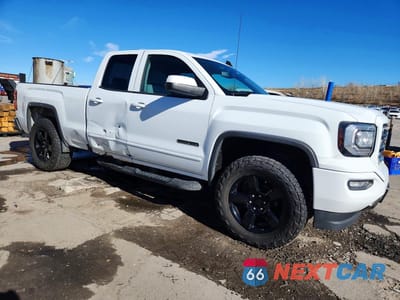 Czwarte zdjęcie samochodu z boku: 2018 GMC SIERRA K1500 VIN:1GTV2LECXJZ229593 - miniatura