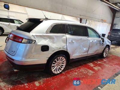 Trzecie zdjęcie samochodu z tyłu: 2012 LINCOLN MKT VIN:2LMHJ5AT2CBL52358 - miniatura