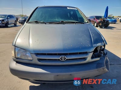 Piąte zdjęcie samochodu w środku: 1999 TOYOTA SIENNA LE VIN:4T3ZF13C1XU130649 - miniatura