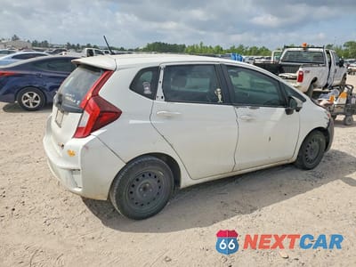 Trzecie zdjęcie samochodu z tyłu: 2017 HONDA FIT LX VIN:3HGGK5H50HM705686 - miniatura