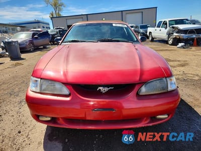 Piąte zdjęcie samochodu w środku: 1997 FORD MUSTANG VIN:1FALP444XVF201105 - miniatura