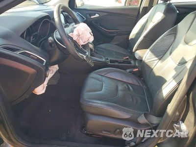 Zdjęcie 7 z 11 samochodu: 2016 FORD FOCUS TITANIUM VIN:1FADP3J25GL242196 - miniatura