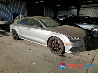 Czwarte zdjęcie samochodu z boku: 2016 AUDI A7 PREMIUM PLUS VIN:WAUWMAFC3GN012059 - miniatura